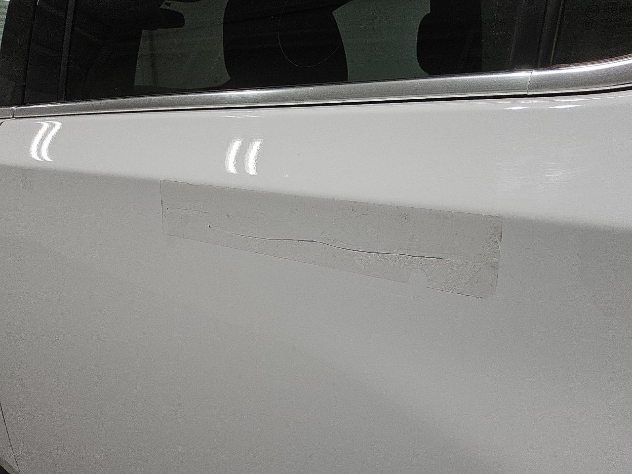 2023 Chevrolet Traverse Lt White vin: 1GNEVMKW2PJ222602 Damage: Left Rear Door, Heavy Scratch, 7 To 8 Inches