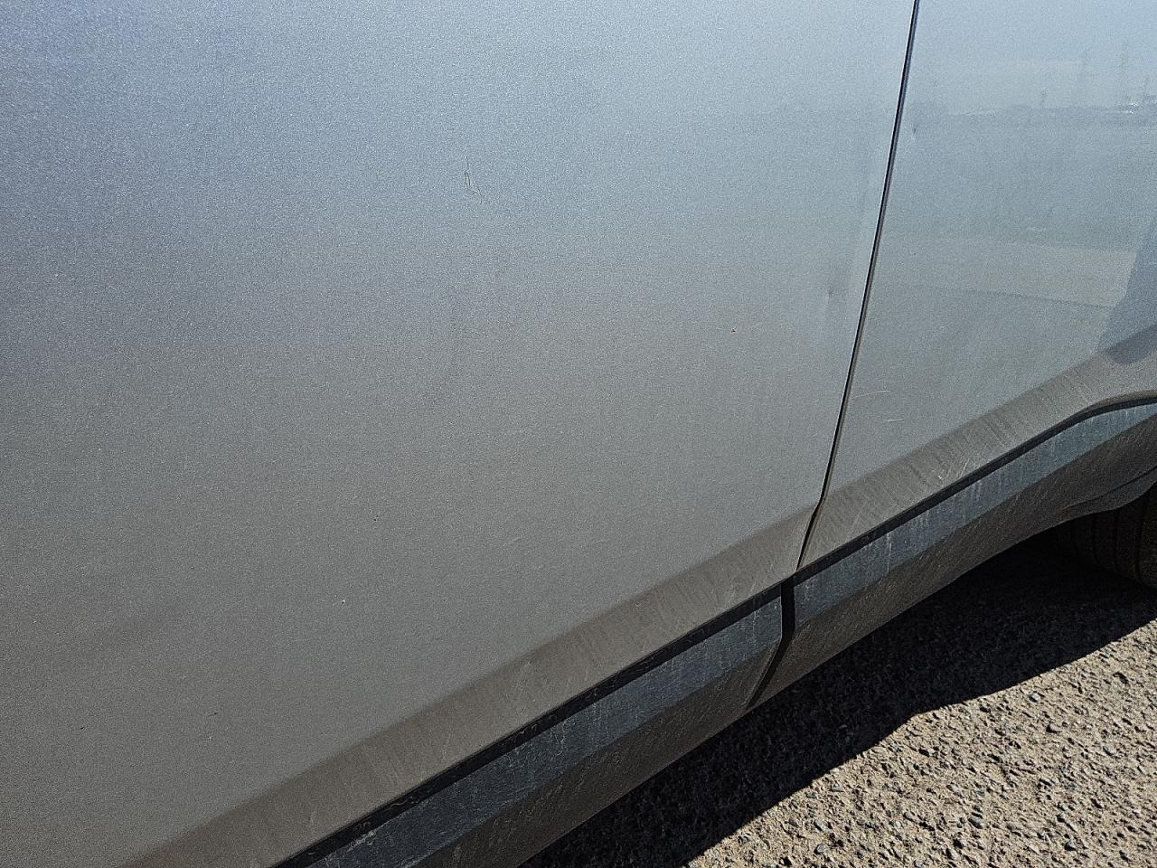 2022 Chevrolet Traverse Lt Silver vin: 1GNEVMKWXNJ170164 Damage: Left Front Door, Dent(S) W/ Paint Dmg, 4 To 5 Inches
