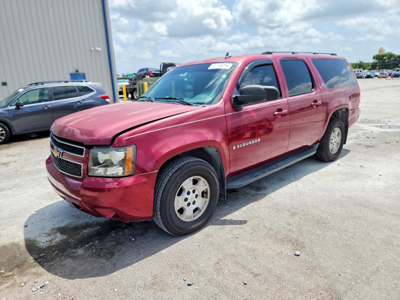 2007 Chevrolet Suburban C1500 Red vin: 1GNFC16J27J215771