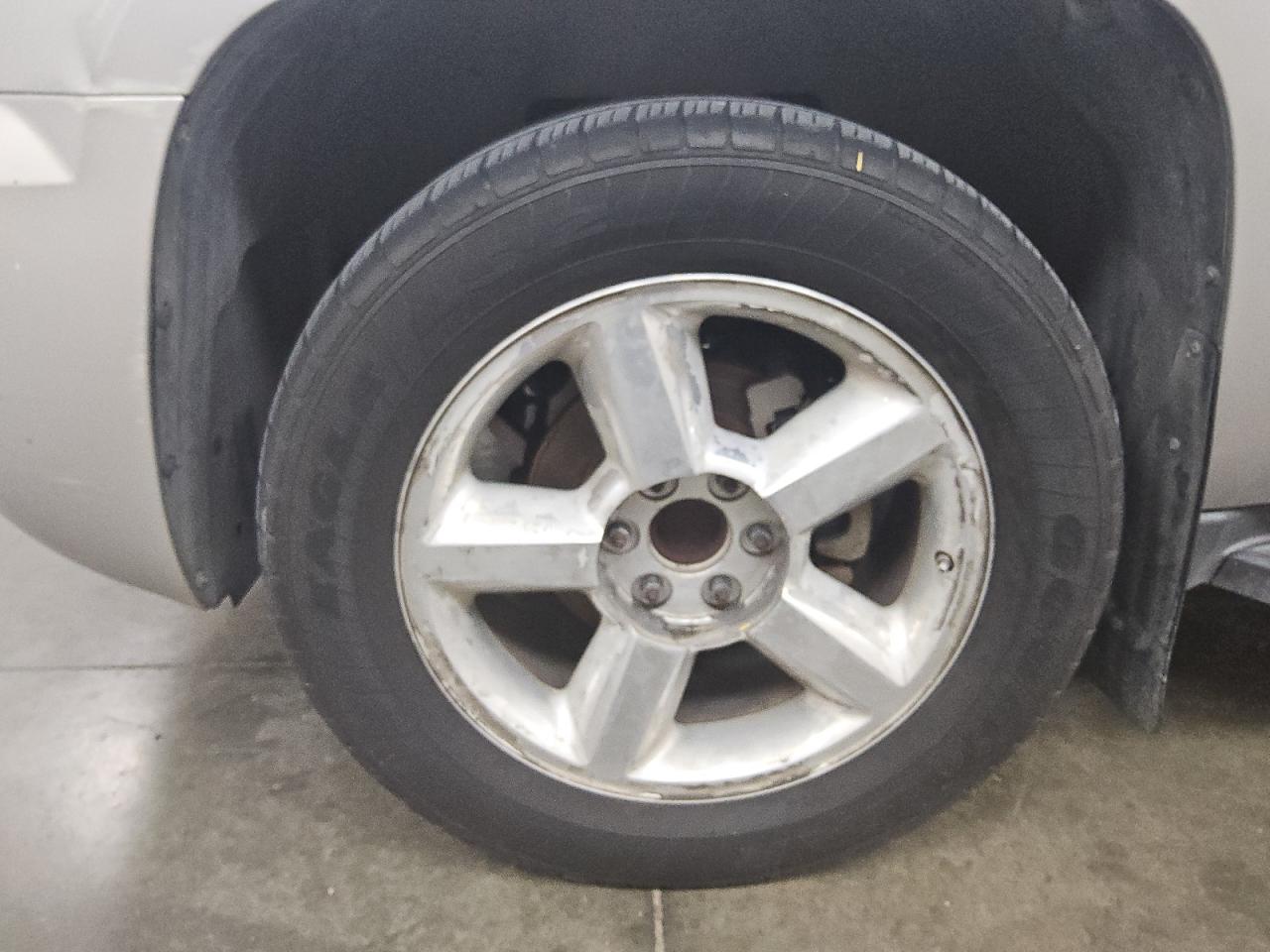 2007 Chevrolet Suburban C1500 Silver vin: 1GNFC16J77J372227 Damage: Left Front Wheel, Corrosion, > 12 Inches