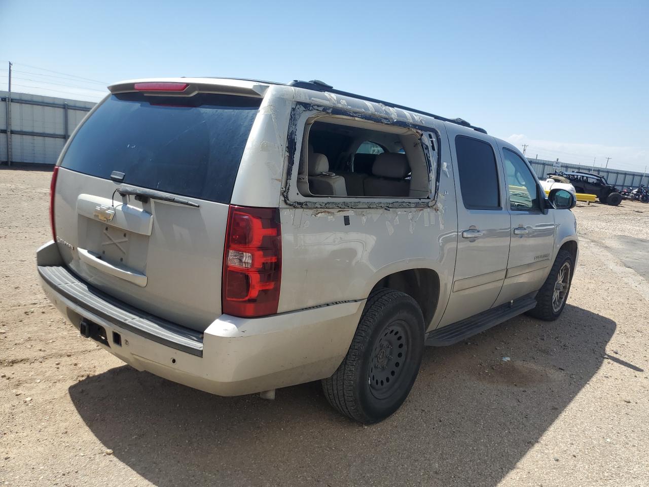 2009 Chevrolet Suburban C1500 Lt Tan vin: 1GNFC26J29J105876 Damage: Right Qtr Flare, Broken, Replacement Required