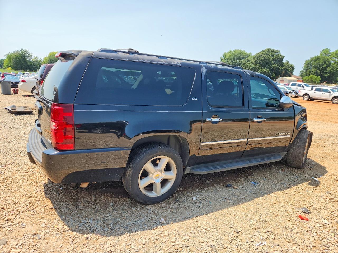 2009 Chevrolet Suburban C1500 Ltz Черный vin: 1GNFC36049J125172