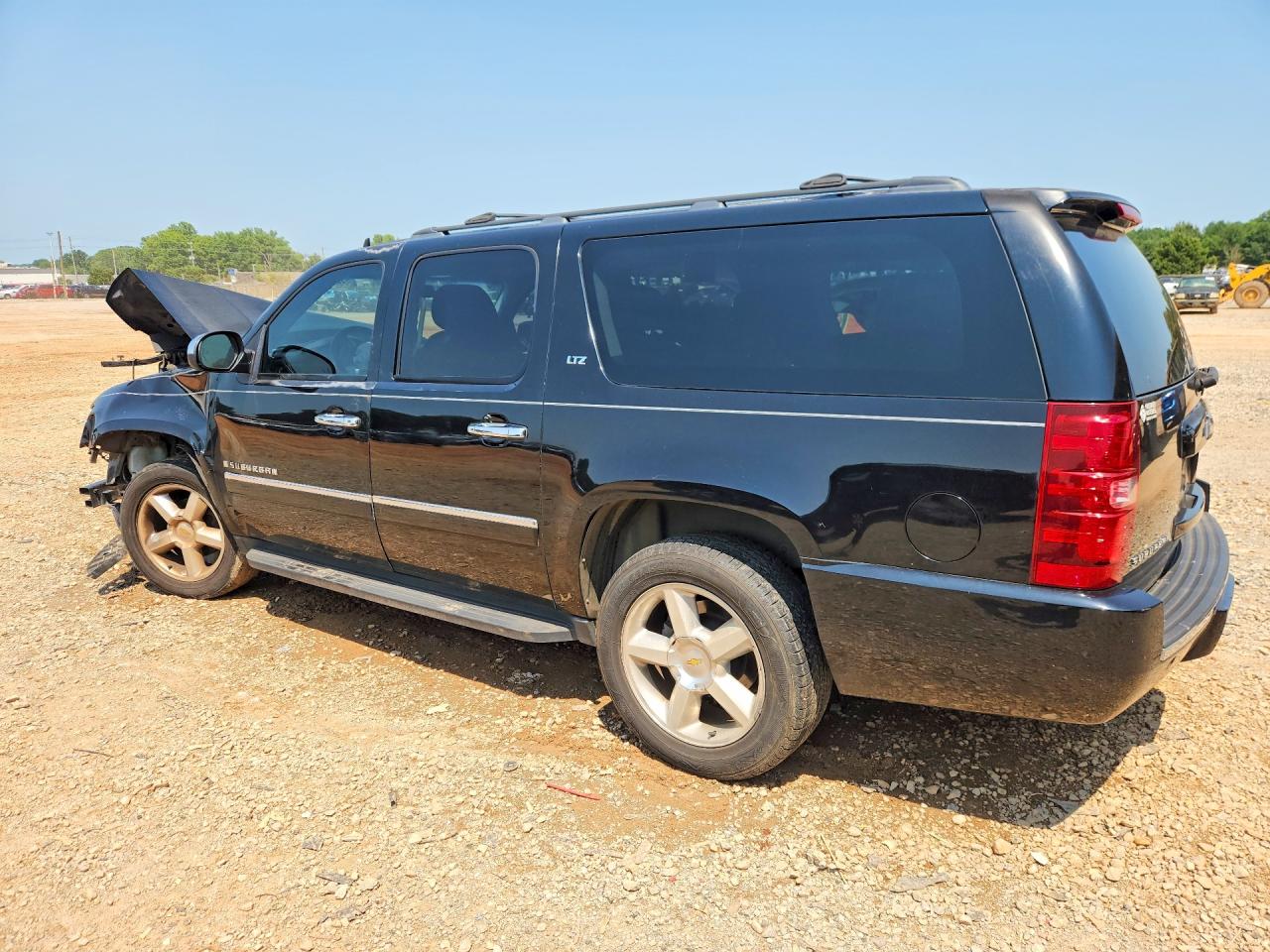2009 Chevrolet Suburban C1500 Ltz Черный vin: 1GNFC36049J125172