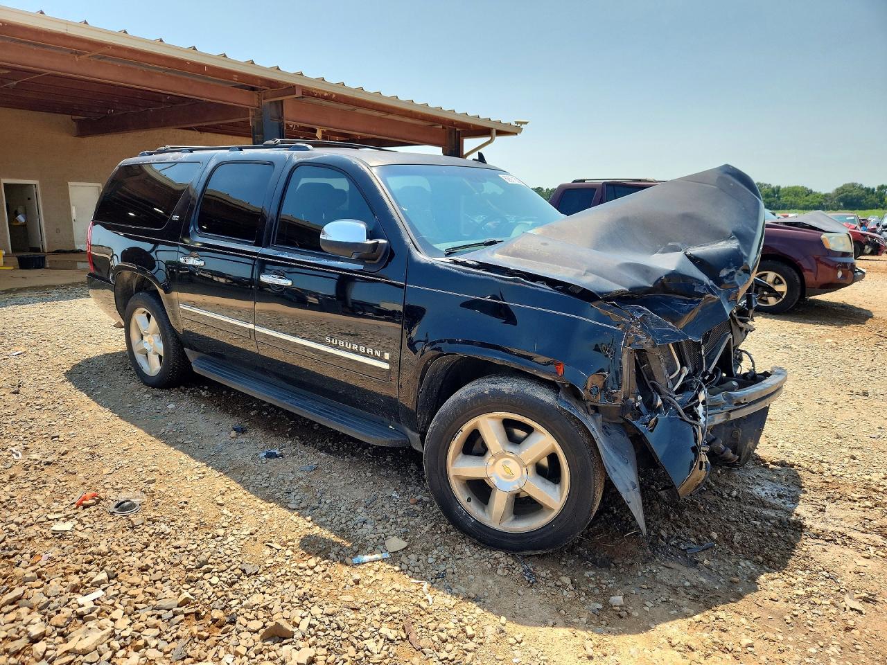 2009 Chevrolet Suburban C1500 Ltz Черный vin: 1GNFC36049J125172