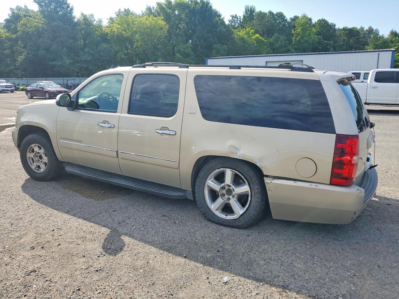 2009 Chevrolet Suburban C1500 Ltz Tan vin: 1GNFC36079R145997