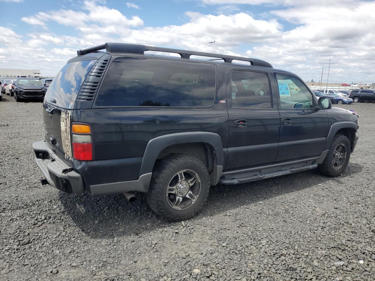 2006 Chevrolet Suburban K1500 Black vin: 1GNFK16ZX6J169176 Damage: Right Qtr Panel, Dent(S) W/ Paint Dmg, 1 To 2 Inches