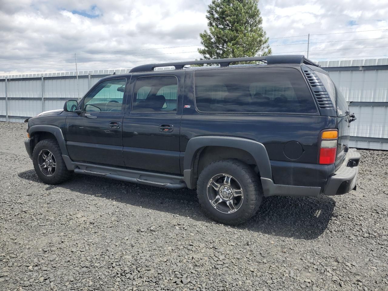 2006 Chevrolet Suburban K1500 Black vin: 1GNFK16ZX6J169176 Damage: Left Qtr Panel, Dent(S) W/ Paint Dmg, 1 To 2 Inches