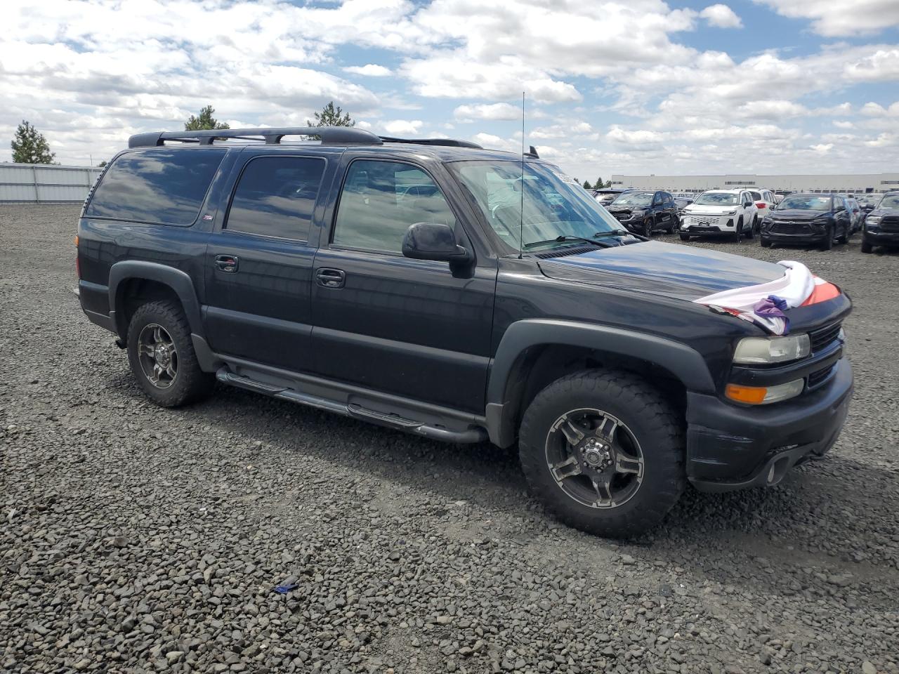 2006 Chevrolet Suburban K1500 Black vin: 1GNFK16ZX6J169176 Damage: Right Front Door, Heavy Scratch, 1/2 To 1 Inch