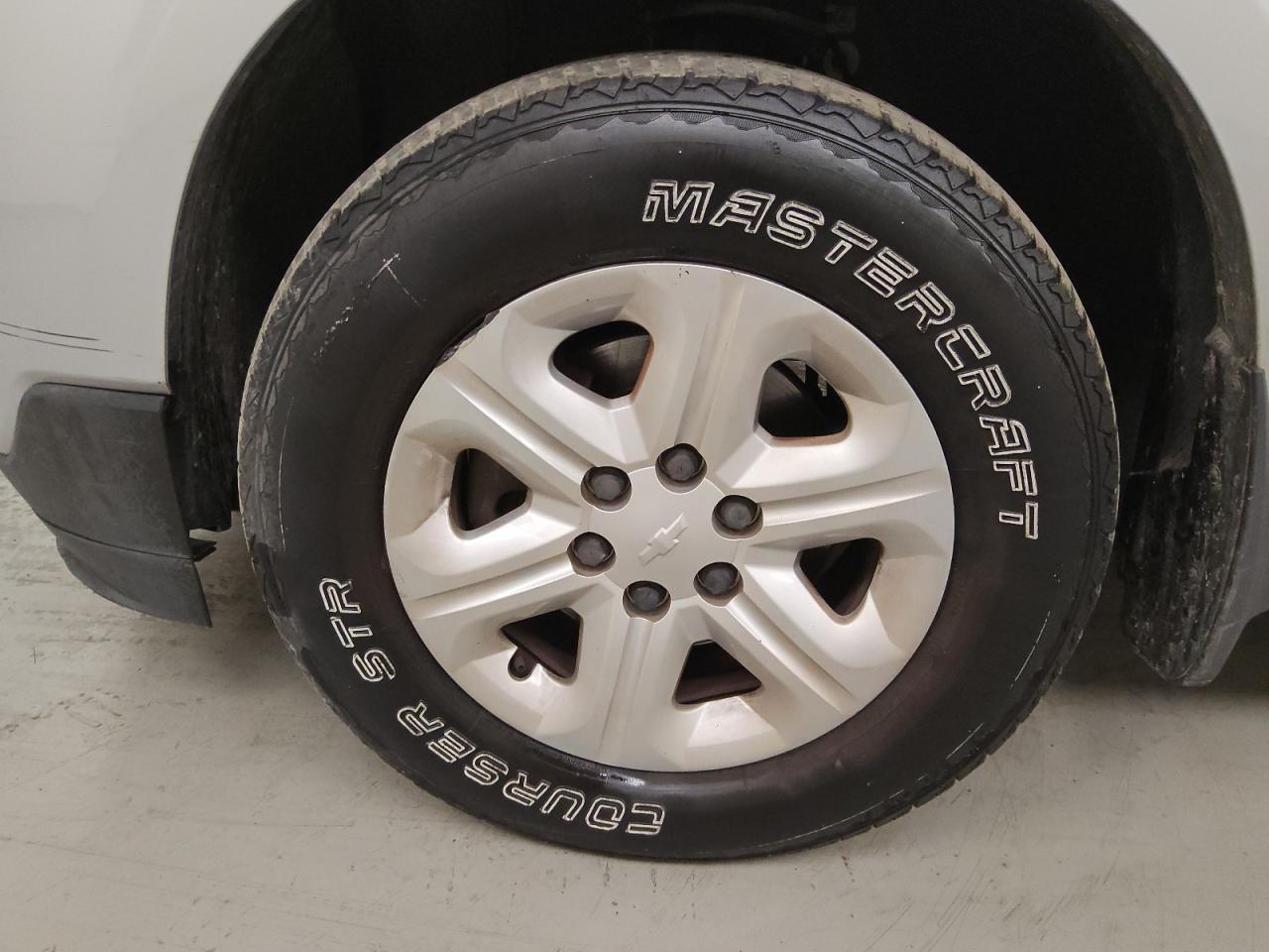 2015 Chevrolet Traverse Ls Silver vin: 1GNKRFEDXFJ344703 Damage: Left Front Wheel Cover, Heavy Scratch, 3 To 4 Inches
