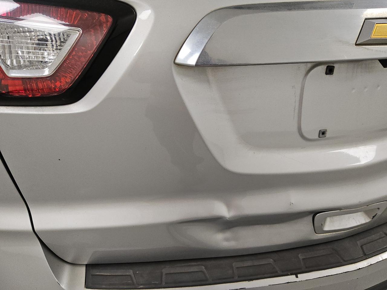 2015 Chevrolet Traverse Ls Silver vin: 1GNKRFEDXFJ344703 Damage: Lift Gate, Dent(S) W/ Paint Dmg, > 12 Inches