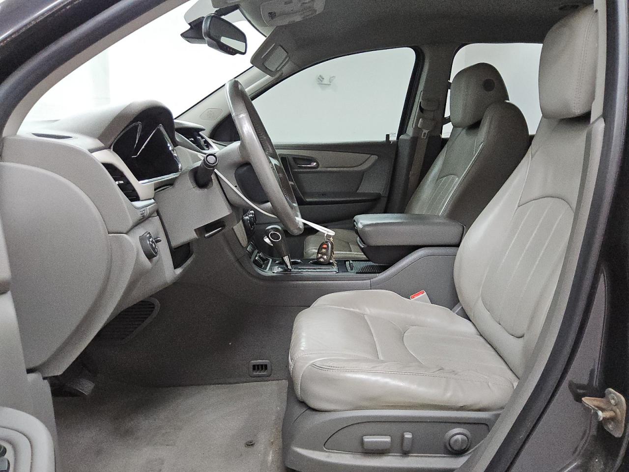 2015 Chevrolet Traverse Ltz Black vin: 1GNKVJKDXFJ307590 Damage: Left Front Seat Cushion, Torn, 1 To 2 Inches