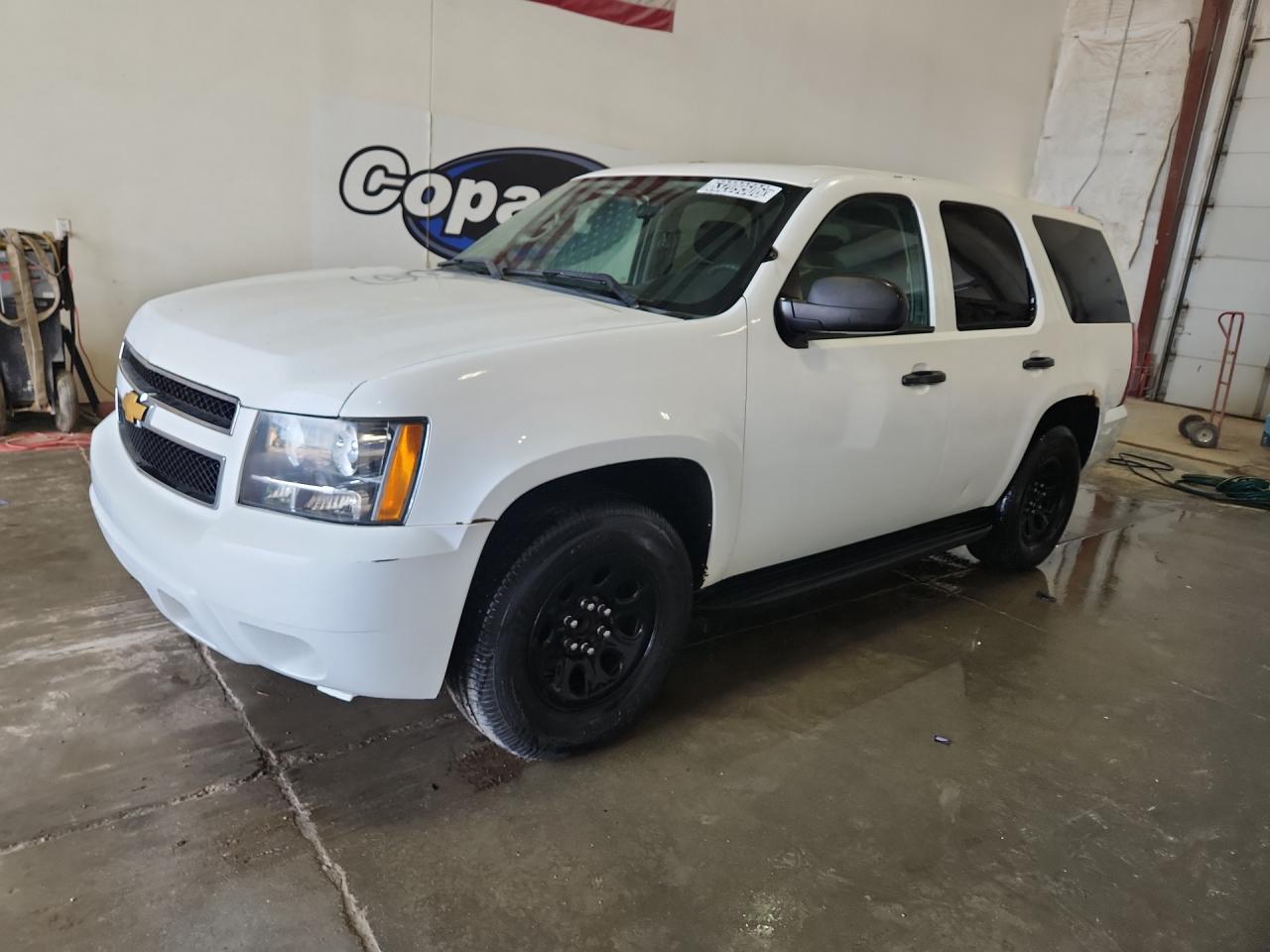 2014 Chevrolet Tahoe Police White vin: 1GNLC2E01ER128864 Damage: Left Front Fender, Chipped, 4