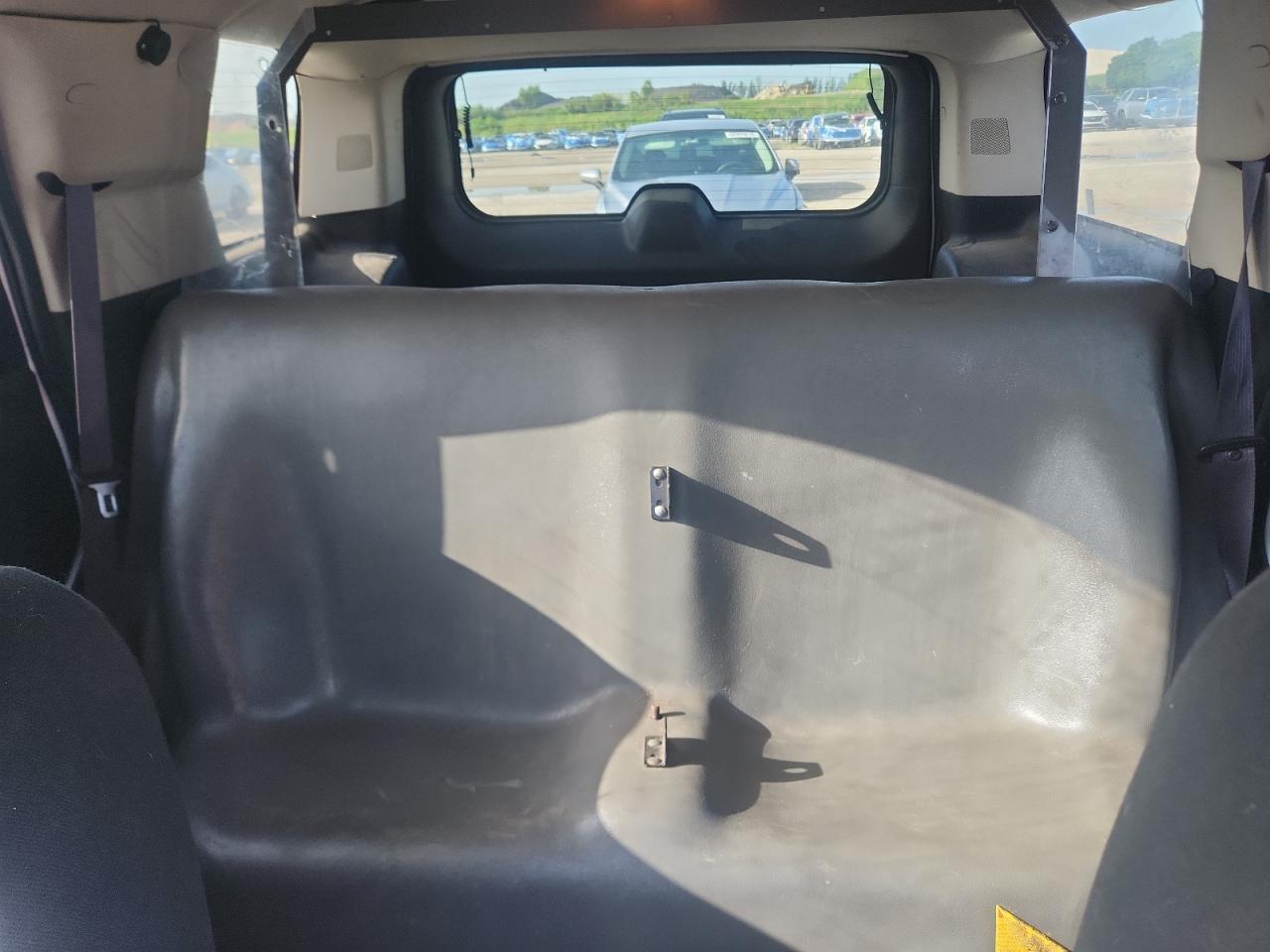 2014 Chevrolet Tahoe Police White vin: 1GNLC2E01ER229287 Damage: Left Rear Seat, Aftermarket, Acceptable