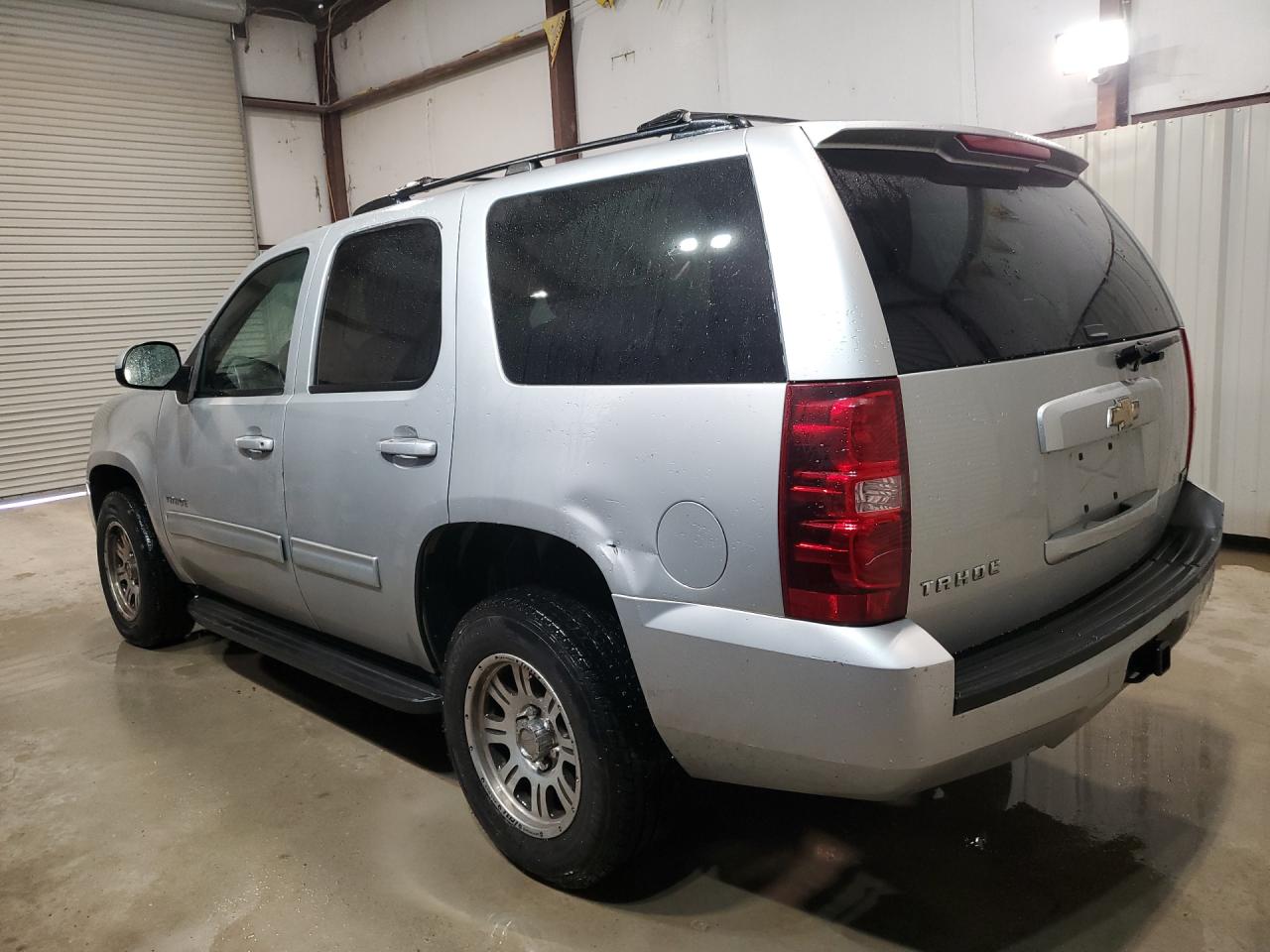 2011 Chevrolet Tahoe C1500 Ls Silver vin: 1GNSCAE03BR205266 Damage: Left Qtr Panel, Dent(S) W/ Paint Dmg, > 12 Inches