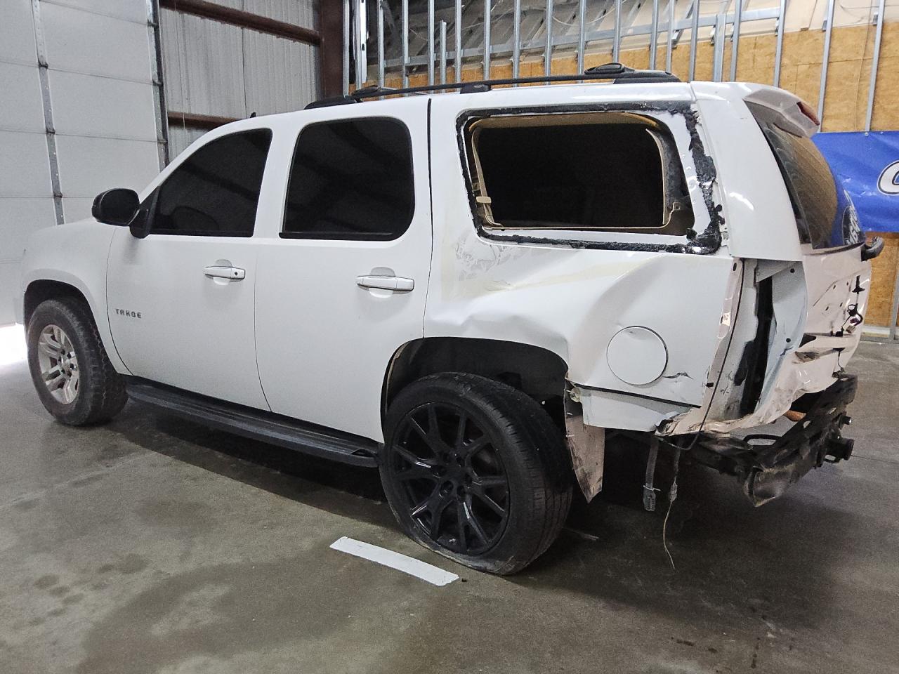 2011 Chevrolet Tahoe C1500 Ls White vin: 1GNSCAE0XBR158429 Damage: Left Qtr Panel, Severe Damage, Replacement Required