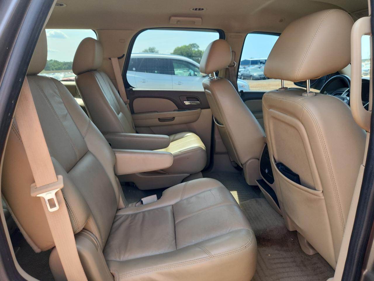 2011 Chevrolet Tahoe C1500 Lt Brown vin: 1GNSCBE06BR269758 Damage: Right Rear Carpet, Stained, Permanent