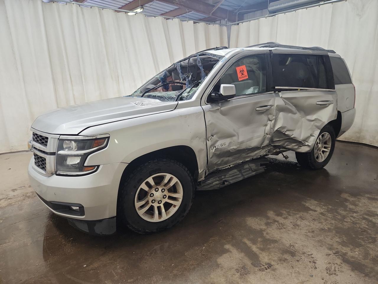 2015 Chevrolet Tahoe C1500 Lt Silver vin: 1GNSCBKC4FR173759 Damage: Left Front Fender, Dent(S) W/ Paint Dmg, > 12 Inches