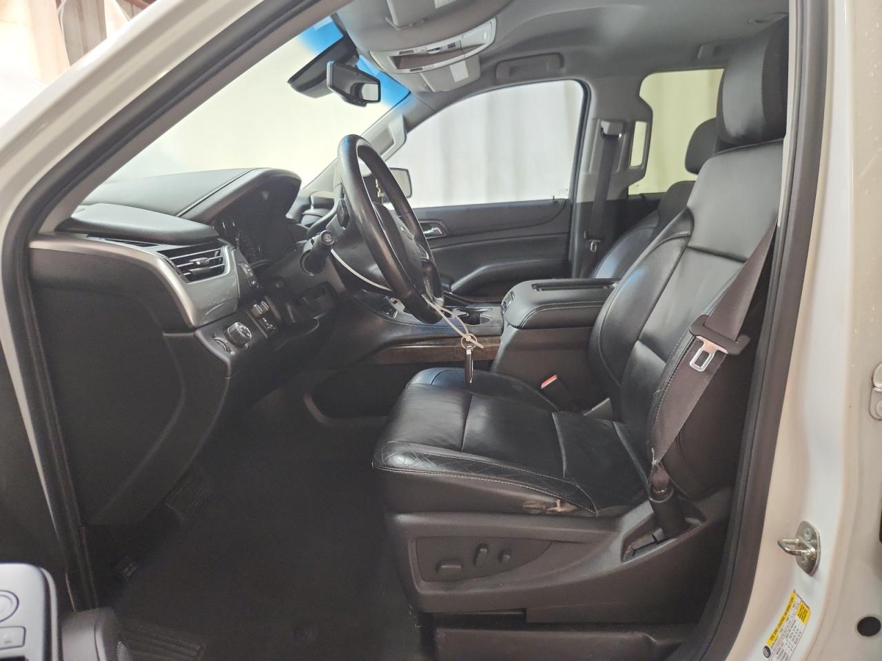 2015 Chevrolet Tahoe C1500 Lt White vin: 1GNSCBKC6FR254858 Damage: Left Front Seat Cushion, Worn, Replacement Required