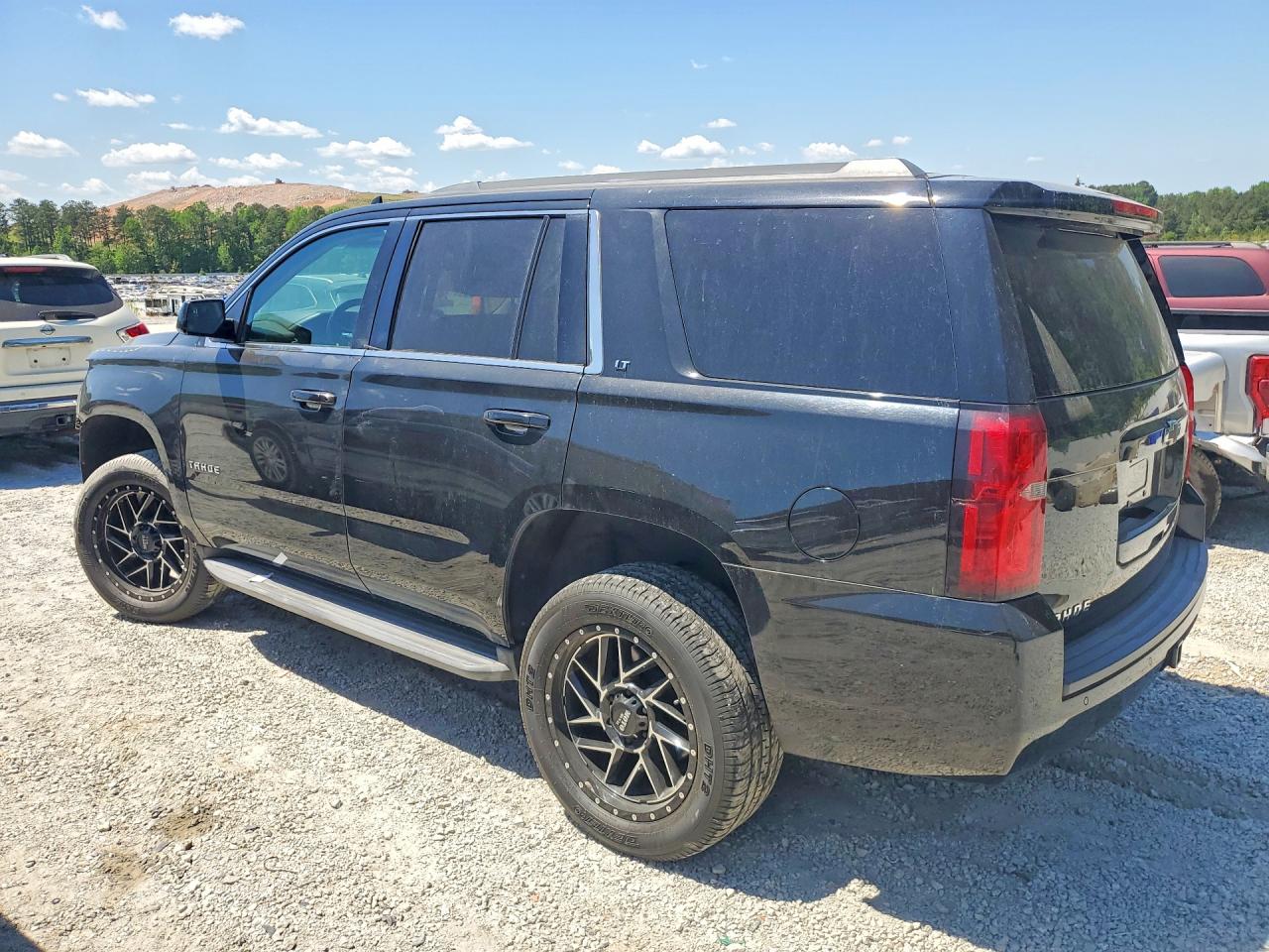 2015 Chevrolet Tahoe C1500 Lt Черный vin: 1GNSCBKC9FR580847
