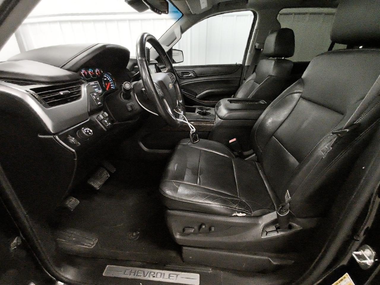 2015 Chevrolet Tahoe C1500 Lt Black vin: 1GNSCBKCXFR585958 Damage: Left Front Seat Cushion, Worn, Replacement Required