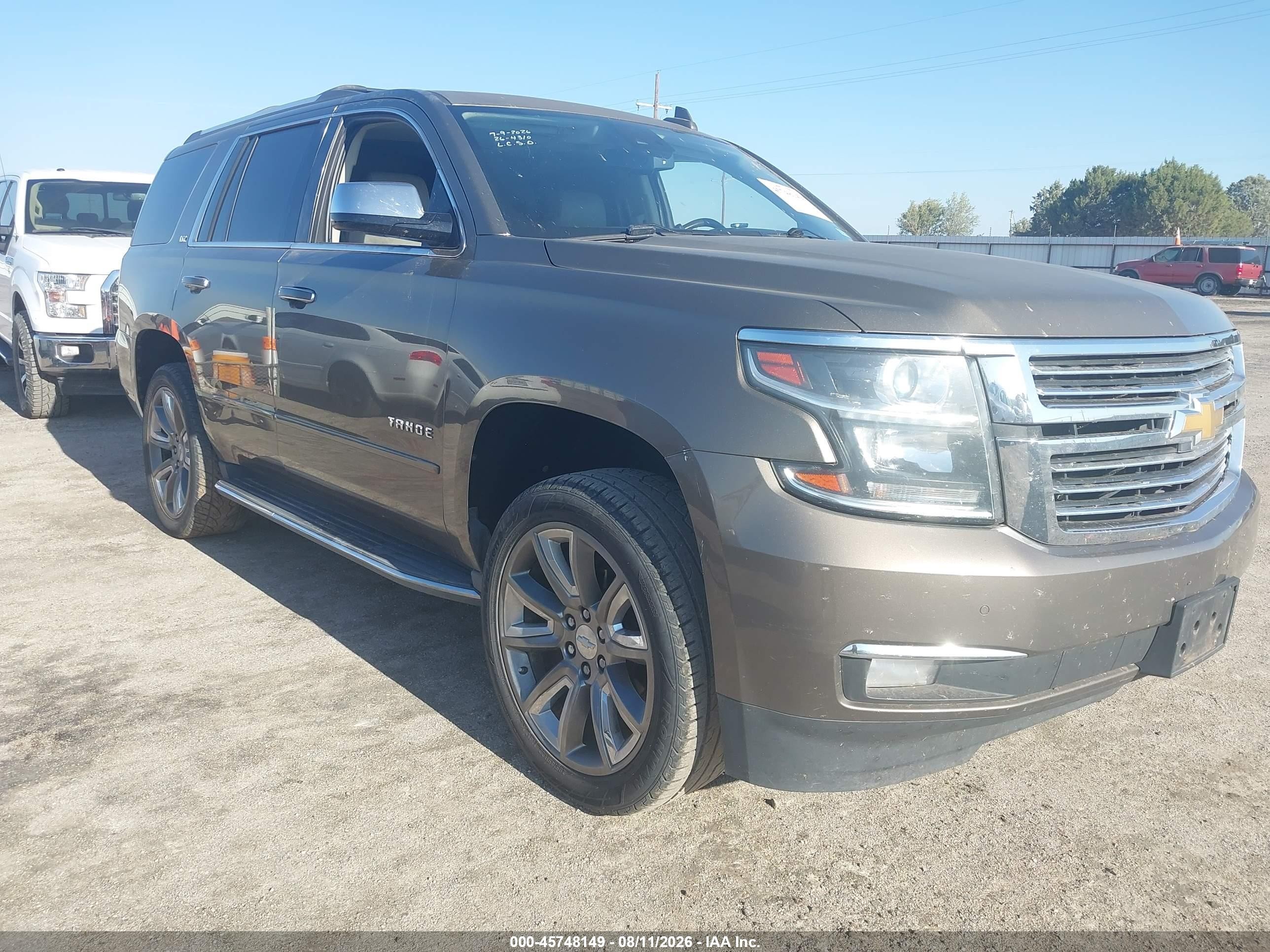 2015 Chevrolet Tahoe Ltz Коричневый vin: 1GNSCCKC1FR596529