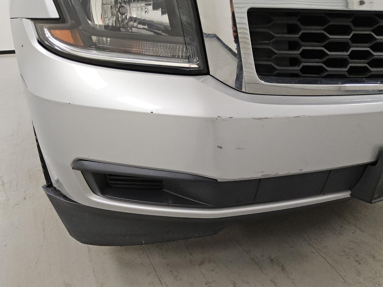 2015 Chevrolet Suburban C1500 Ls Silver vin: 1GNSCHKCXFR138517 Damage: Front Bumper, Heavy Scratch, 2 To 3 Inches