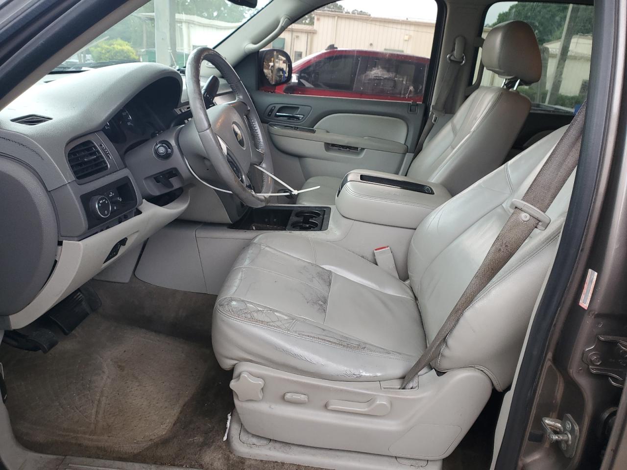 2012 Chevrolet Suburban C1500 Lt Brown vin: 1GNSCJE09CR188474 Damage: Left Front Seat, Torn, 1 To 2 Inches