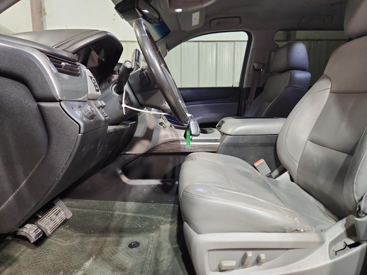 2015 Chevrolet Suburban Black vin: 1GNSCJKC4FR183508 Damage: Left Front Seat Cushion, Cut, 1 To 2 Inches