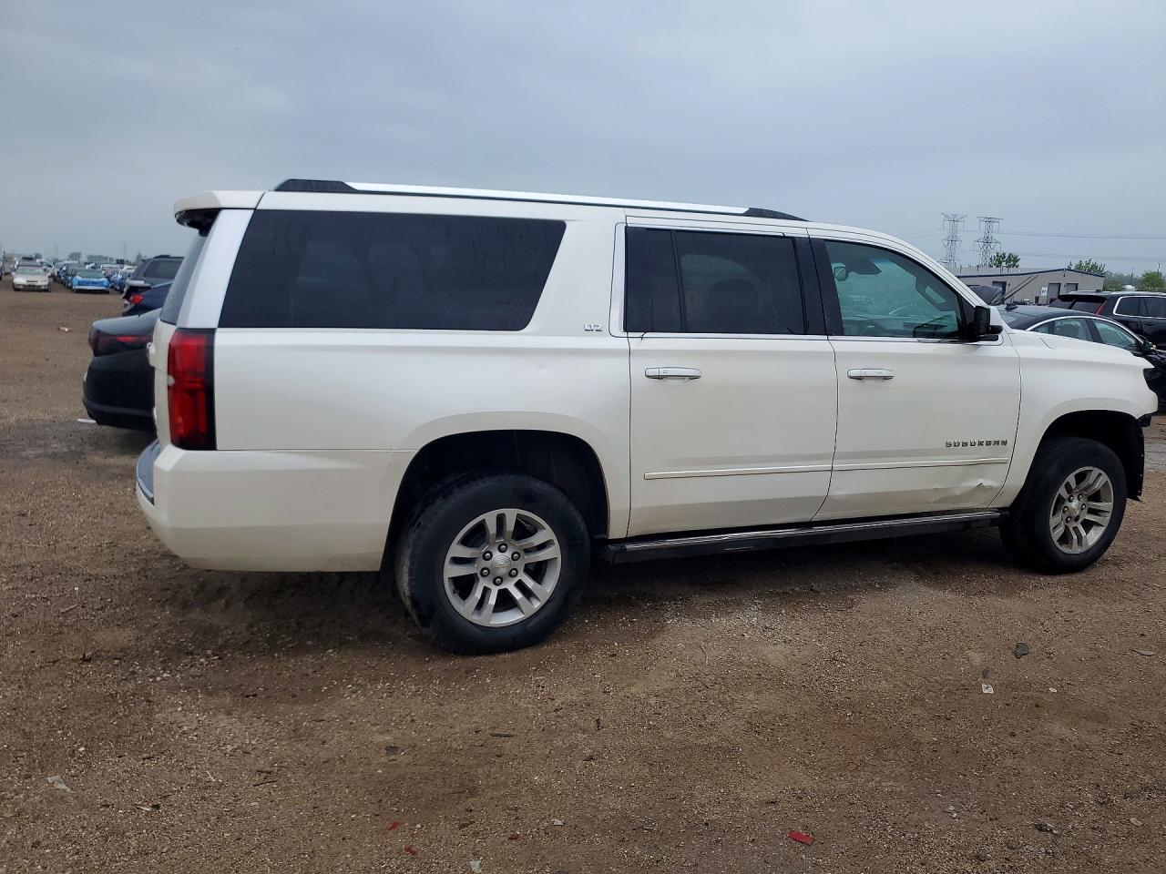 2015 Chevrolet Suburban C1500 Ltz Белый vin: 1GNSCKKC0FR120010