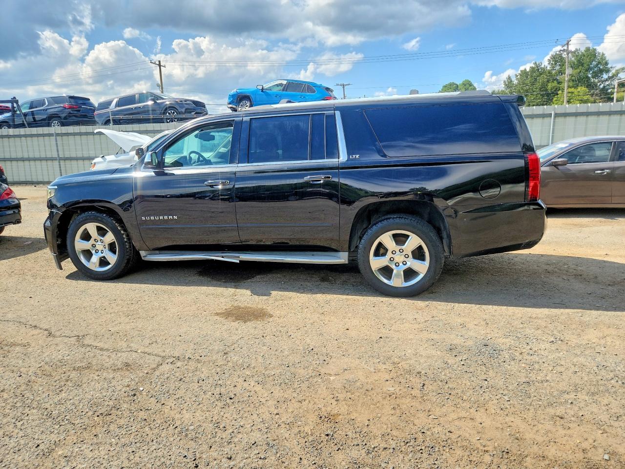 2015 Chevrolet Suburban C1500 Ltz Черный vin: 1GNSCKKC9FR263117