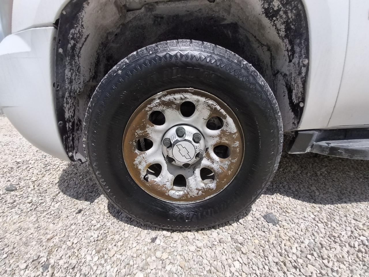 2013 Chevrolet Suburban K1500 White vin: 1GNSK5E7XDR269704 Damage: Left Front Wheel, Corrosion, > 12 Inches