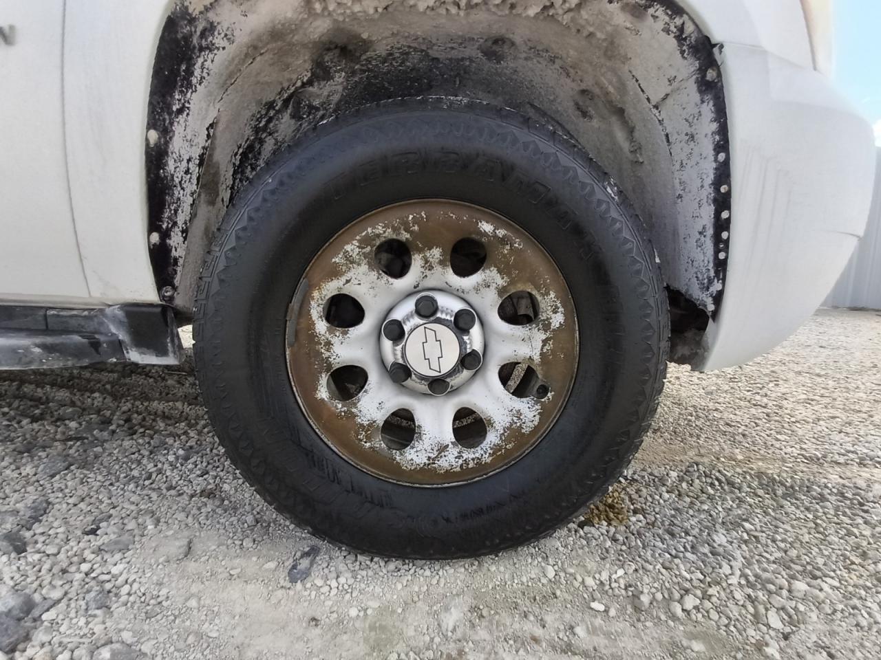 2013 Chevrolet Suburban K1500 White vin: 1GNSK5E7XDR269704 Damage: Right Front Wheel, Corrosion, > 12 Inches