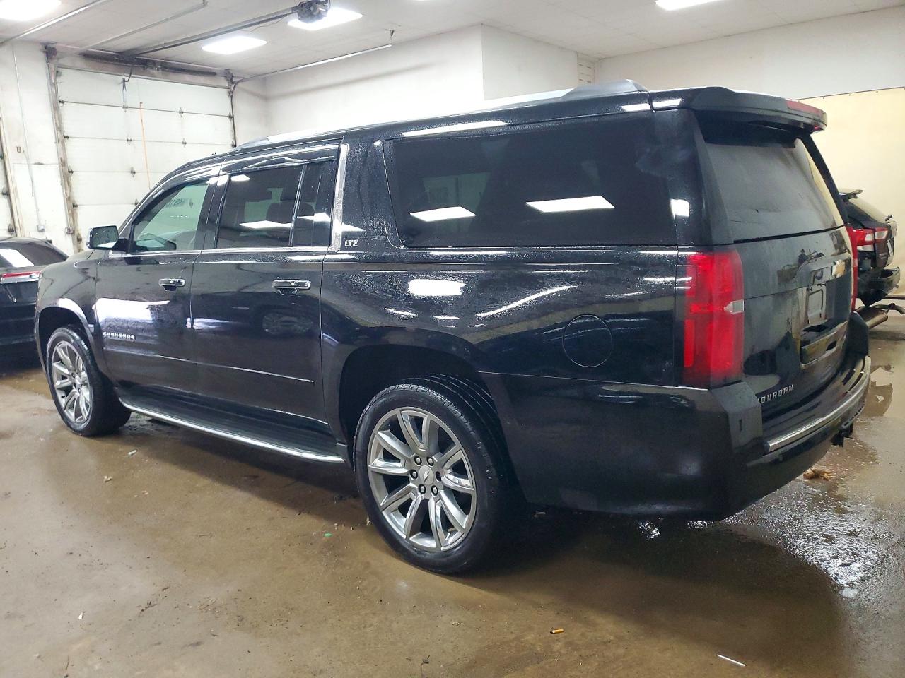 2015 Chevrolet Suburban K1500 Ltz Черный vin: 1GNSKKKC6FR511536