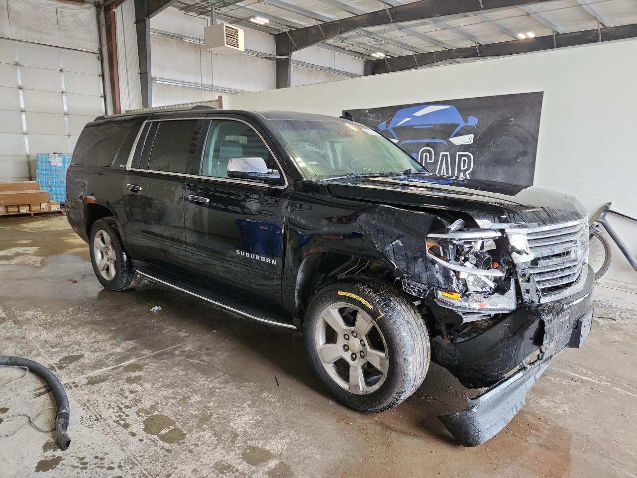 2015 Chevrolet Suburban K1500 Ltz Black vin: 1GNSKKKC8FR691909 Damage: Right Front Fender, Dent(S) W/ Paint Dmg, > 12 Inches