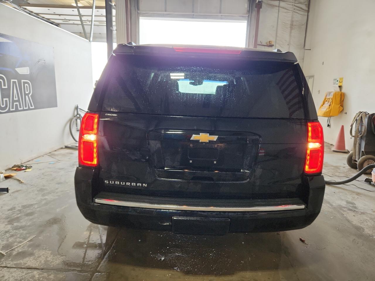 2015 Chevrolet Suburban K1500 Ltz Black vin: 1GNSKKKC8FR691909 Damage: Rear Bumper, Chipped, 2