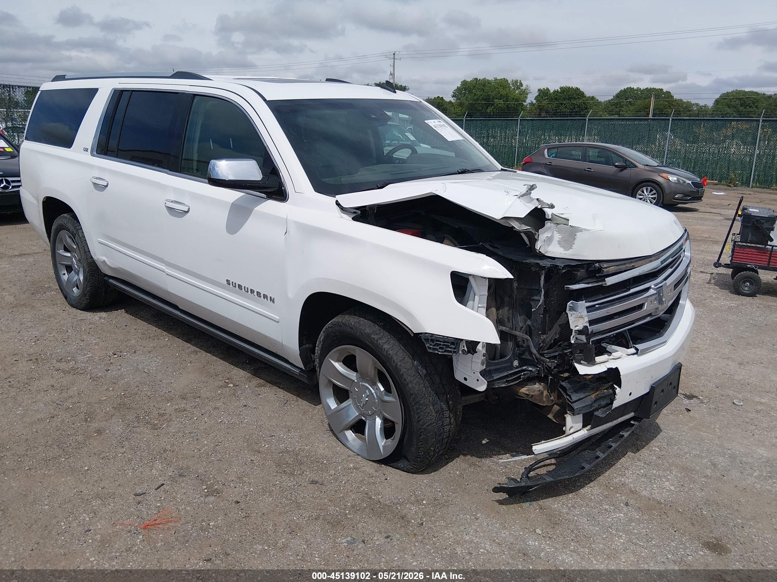 2015 Chevrolet Suburban 1500 Ltz Белый vin: 1GNSKKKC9FR115763