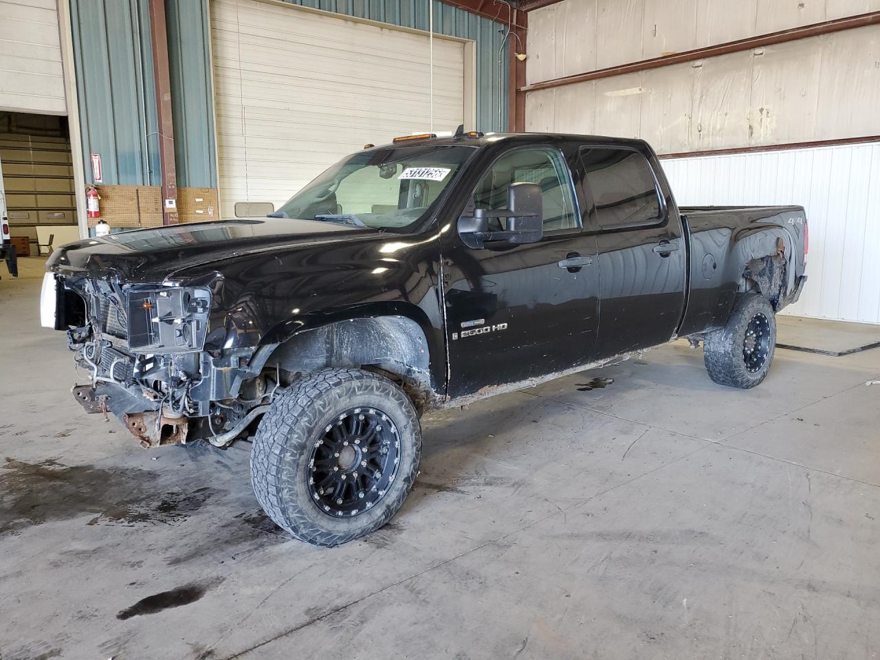 2009 Gmc Sierra K2500 Sle Black vin: 1GTHK53629F151992 Damage: Left Front Wheel, Aftermarket, Acceptable