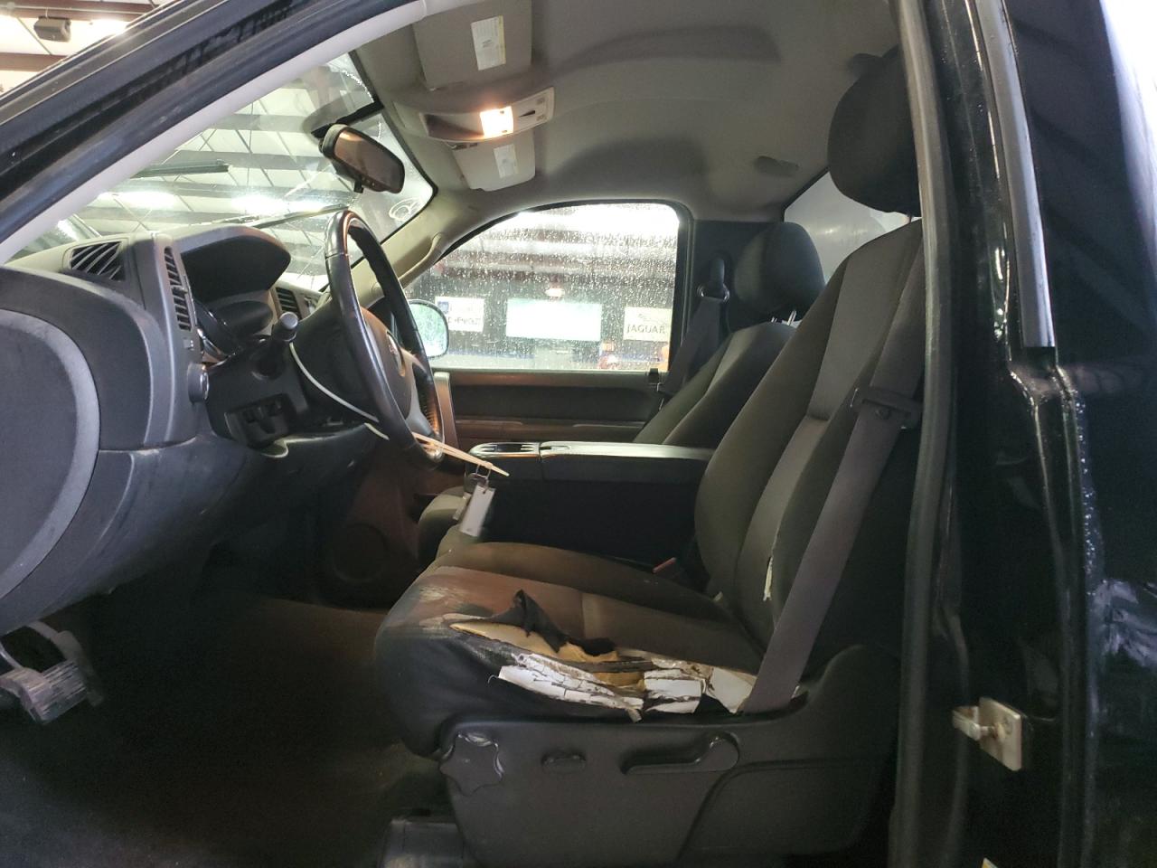 2011 Gmc Sierra K1500 Sle Black vin: 1GTN2VE04BZ327019 Damage: Left Front Seat, Torn, > 12 Inches