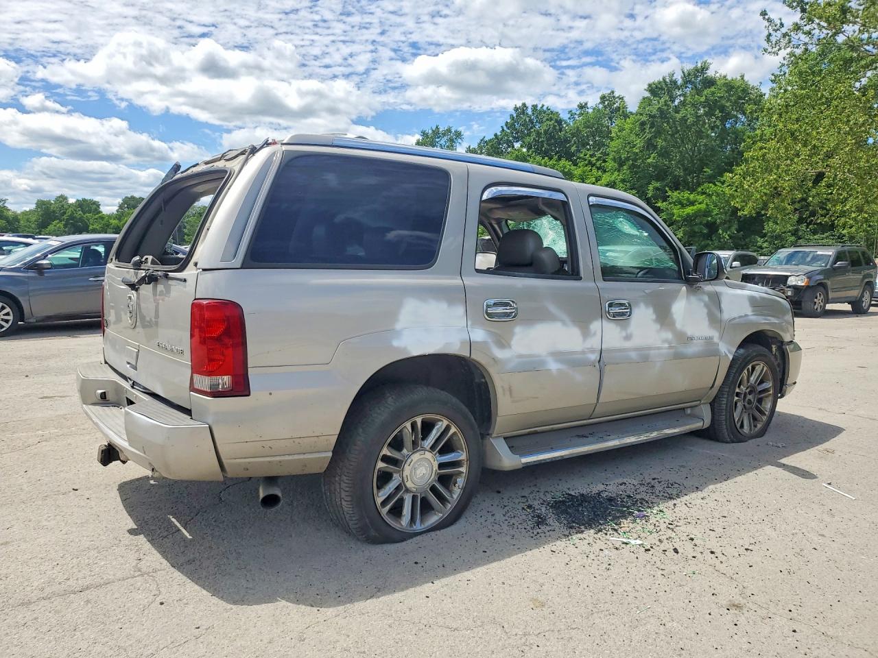 2005 Cadillac Escalade Luxury Золотой vin: 1GYEC63N35R234301