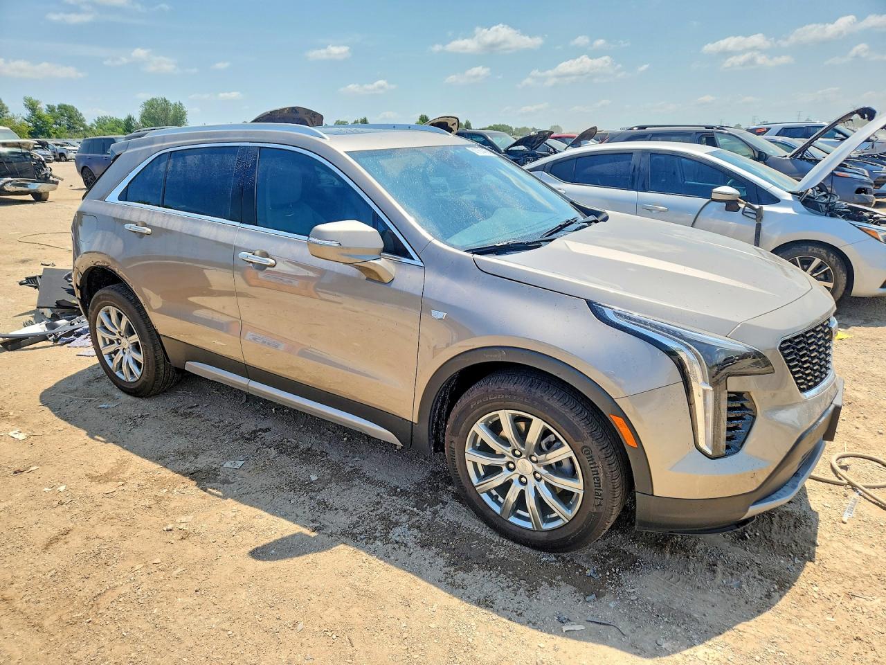 2023 Cadillac Xt4 Premium Luxury Tan vin: 1GYFZDR4XPF143567