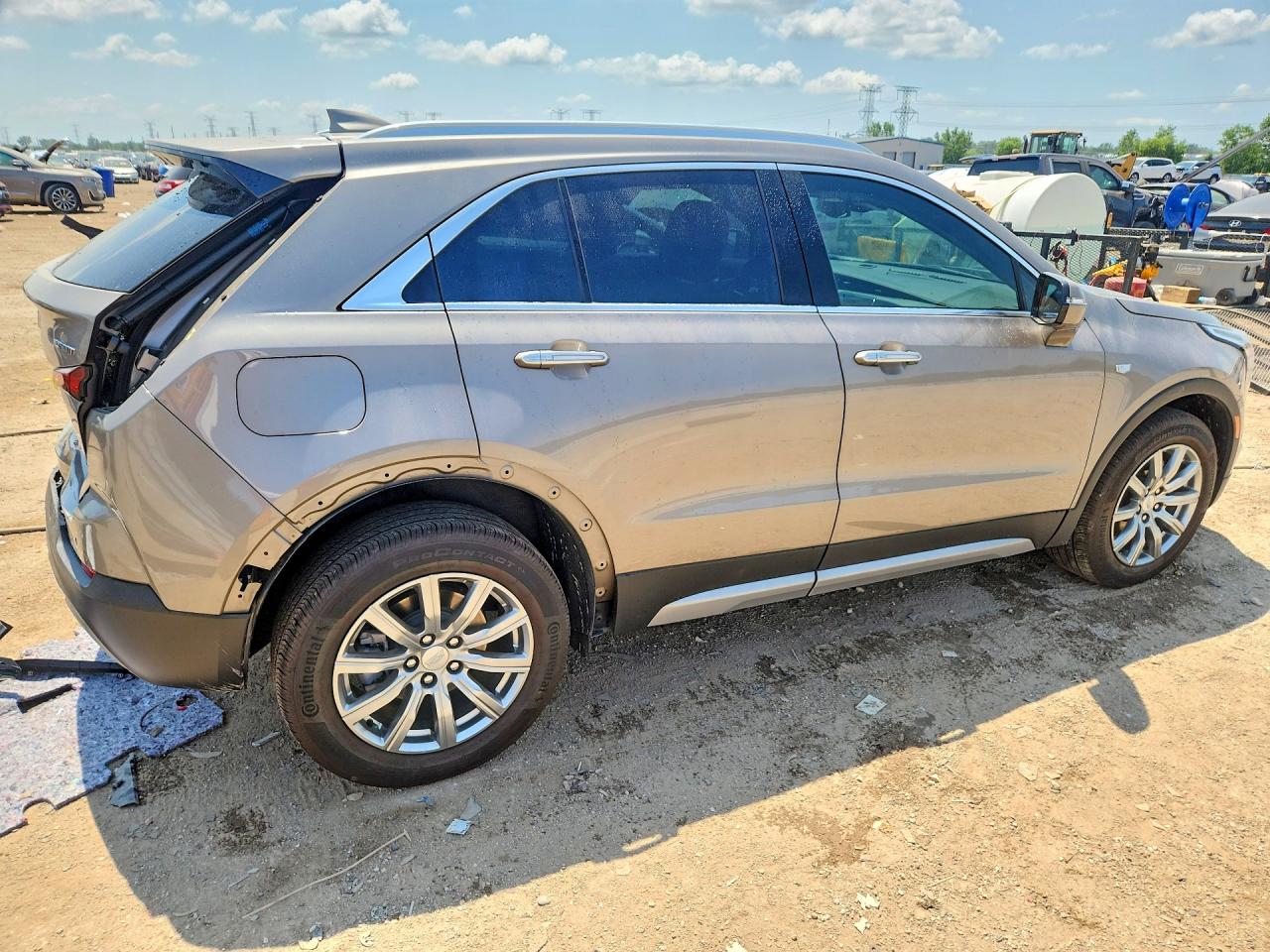 2023 Cadillac Xt4 Premium Luxury Tan vin: 1GYFZDR4XPF143567