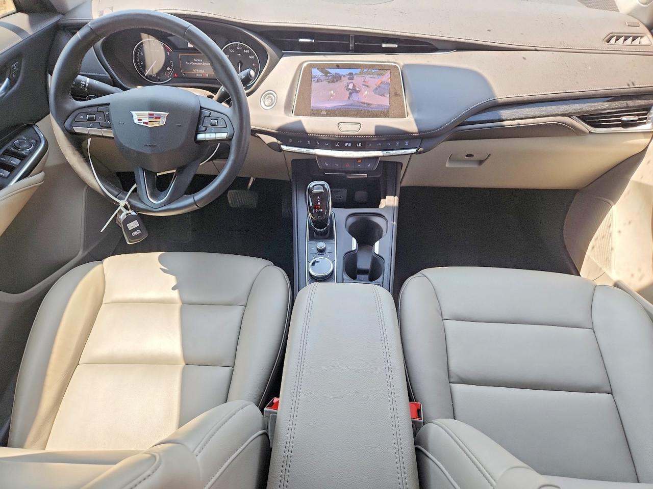 2023 Cadillac Xt4 Premium Luxury Tan vin: 1GYFZDR4XPF143567
