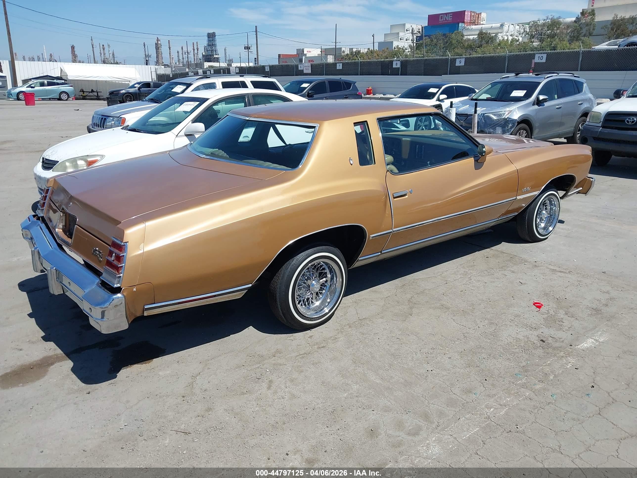 1977 Chevrolet Monte Carlo   Золотой vin: 1H57L7Z430036    