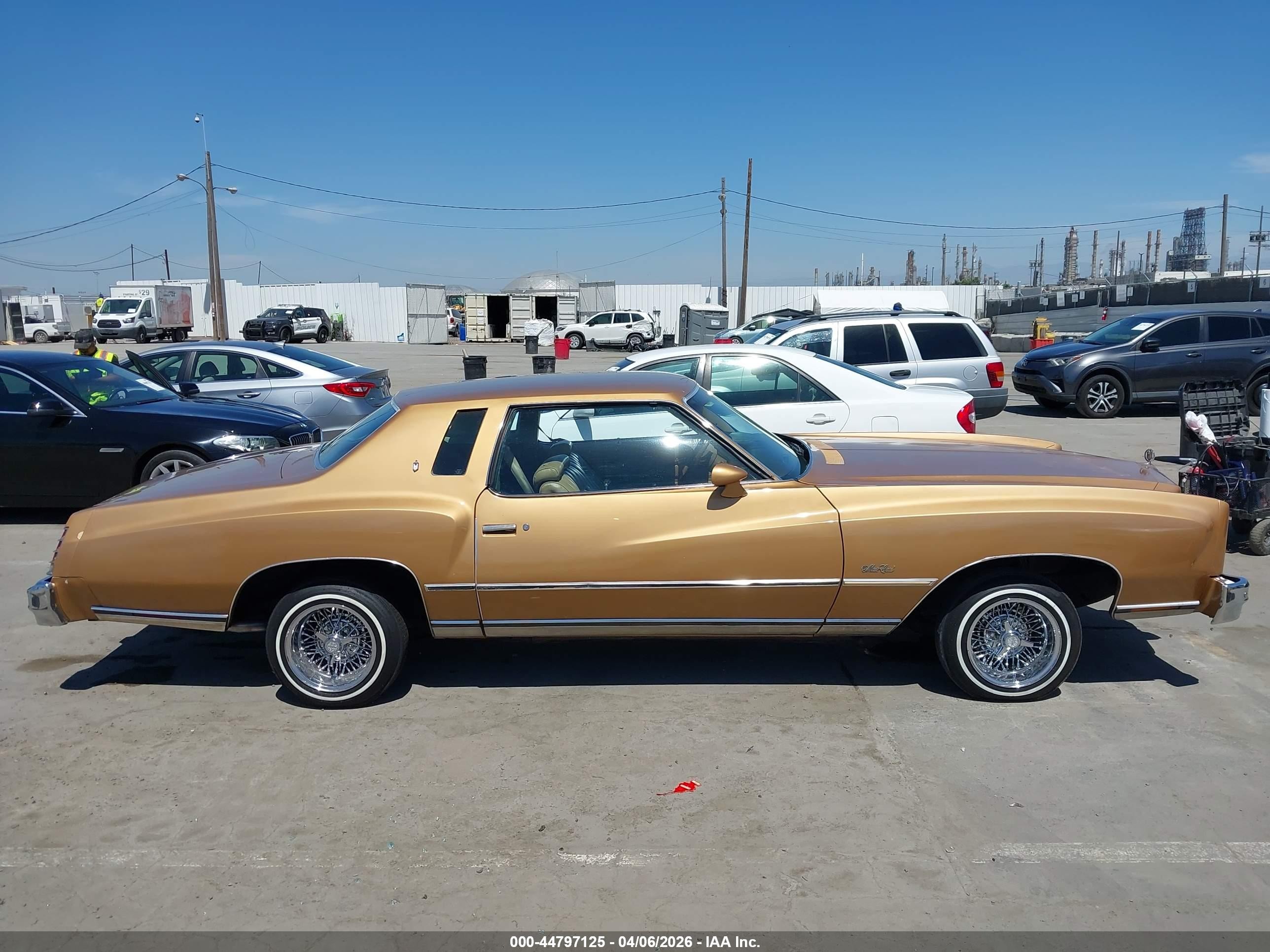 1977 Chevrolet Monte Carlo   Золотой vin: 1H57L7Z430036    