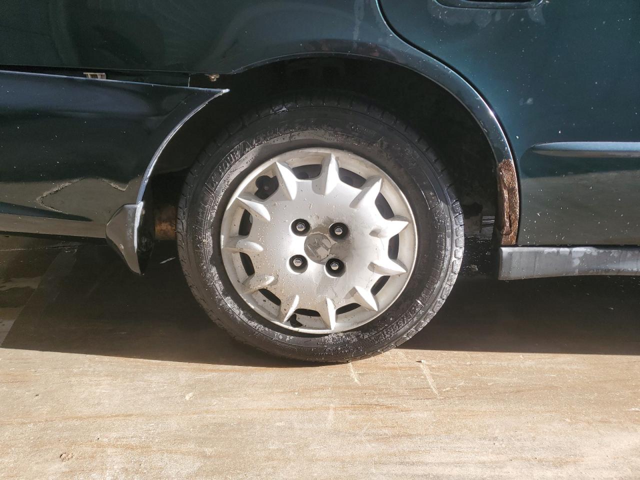 2001 Honda Accord Lx Green vin: 1HGCG56441A139481 Damage: Right Qtr Panel, Rust, > 12 Inches