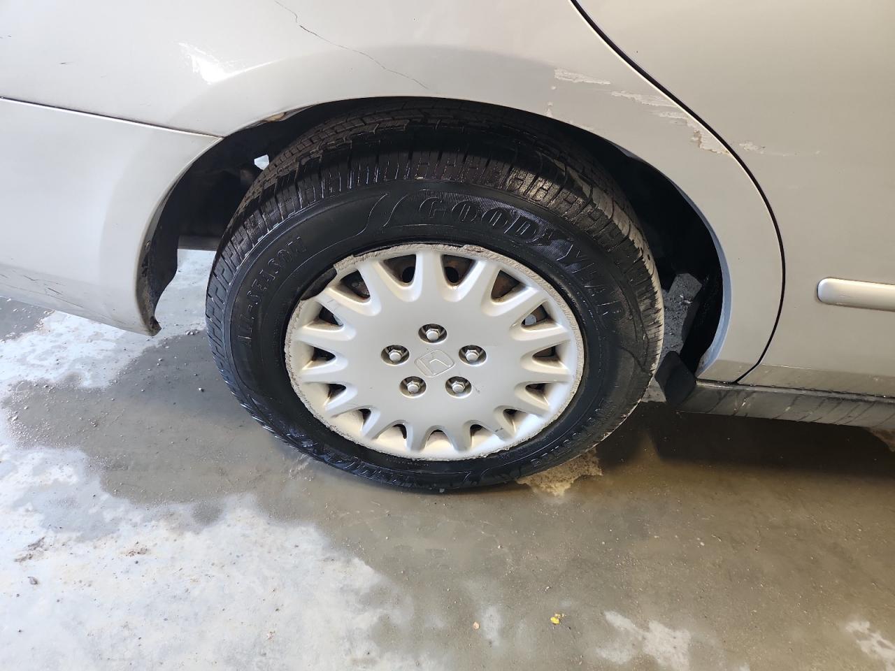 2007 Honda Accord Value Silver vin: 1HGCM56157A194335 Damage: Right Rear Wheel Cover, Broken, Replacement Required