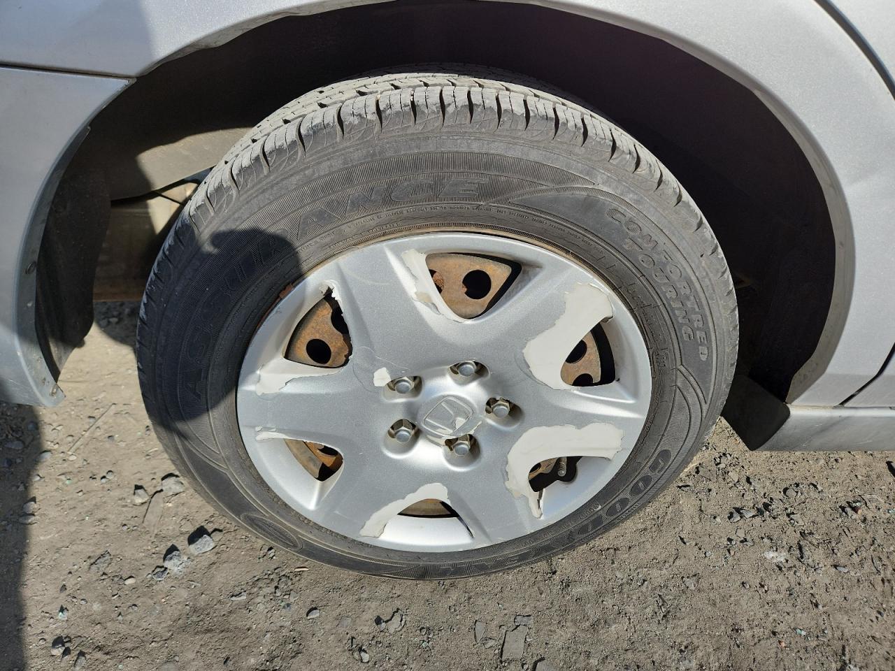 2007 Honda Accord Lx Silver vin: 1HGCM564X7A101660 Damage: Left Front Wheel Cover, Peeling, > 12 Inches