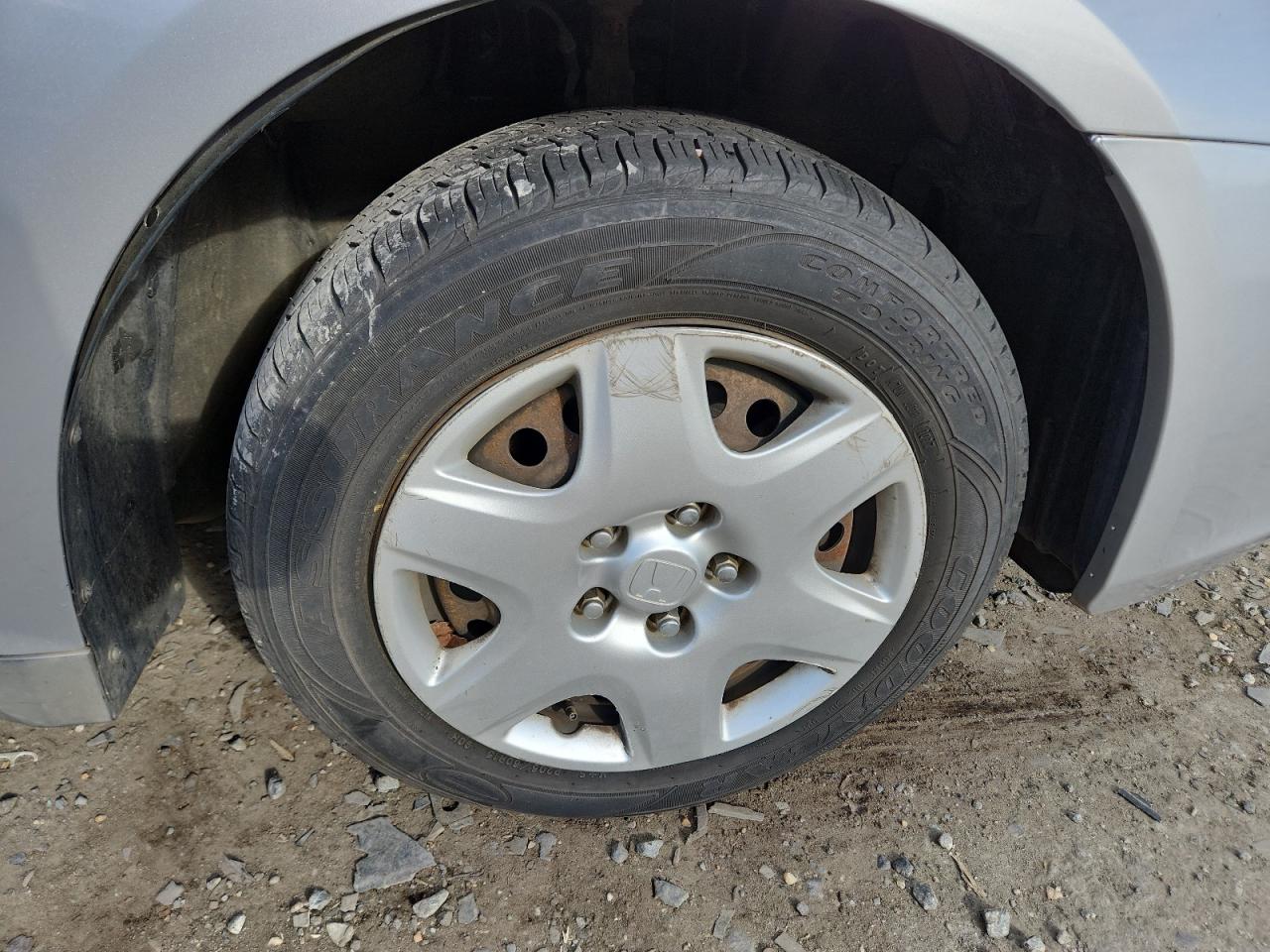 2007 Honda Accord Lx Silver vin: 1HGCM564X7A101660 Damage: Right Front Wheel Cover, Curb Rash, 4 To 5 Inches