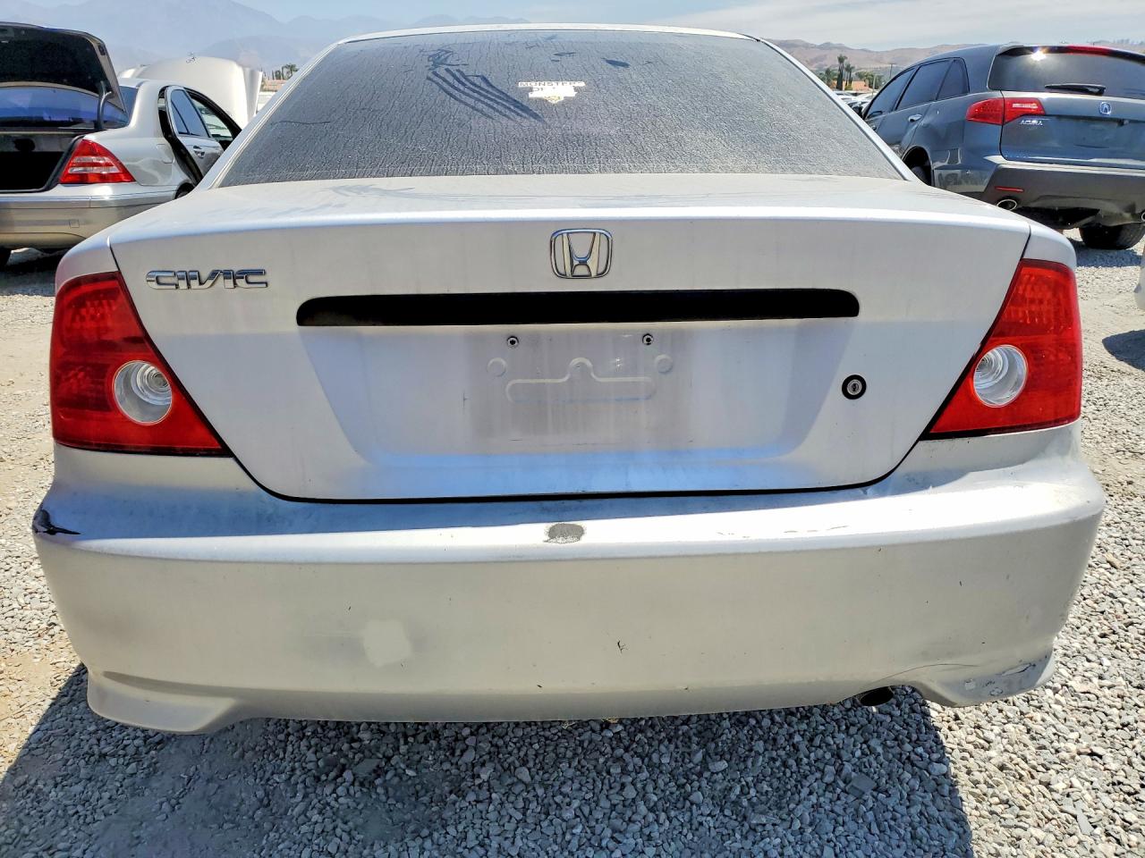 2004 Honda Civic Dx Vp Silver vin: 1HGEM22134L028201