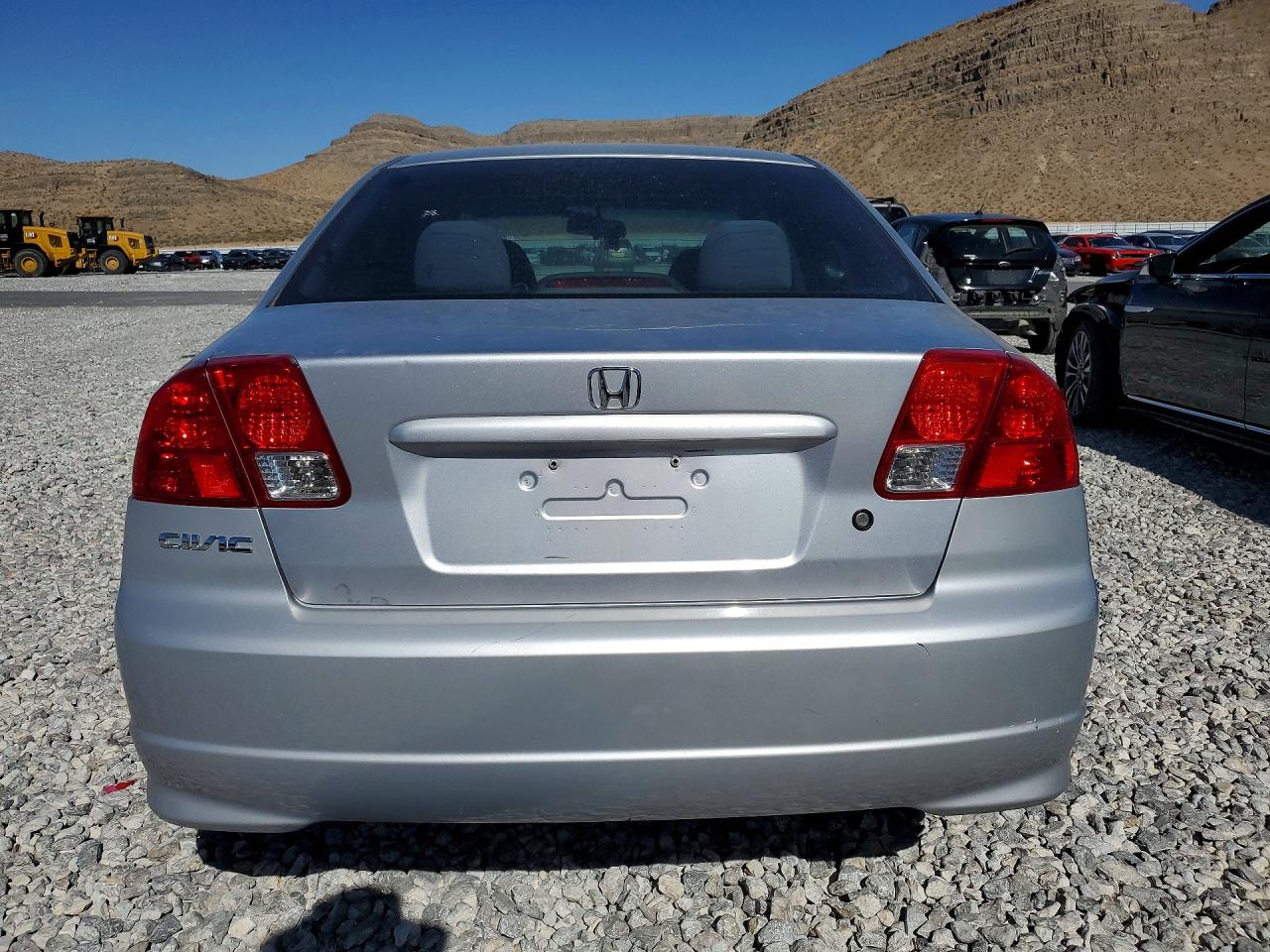 2005 Honda Civic Dx Silver vin: 1HGES16475L014954